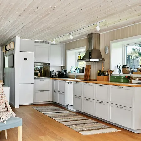 Elegant And Personal Style In Holloselund